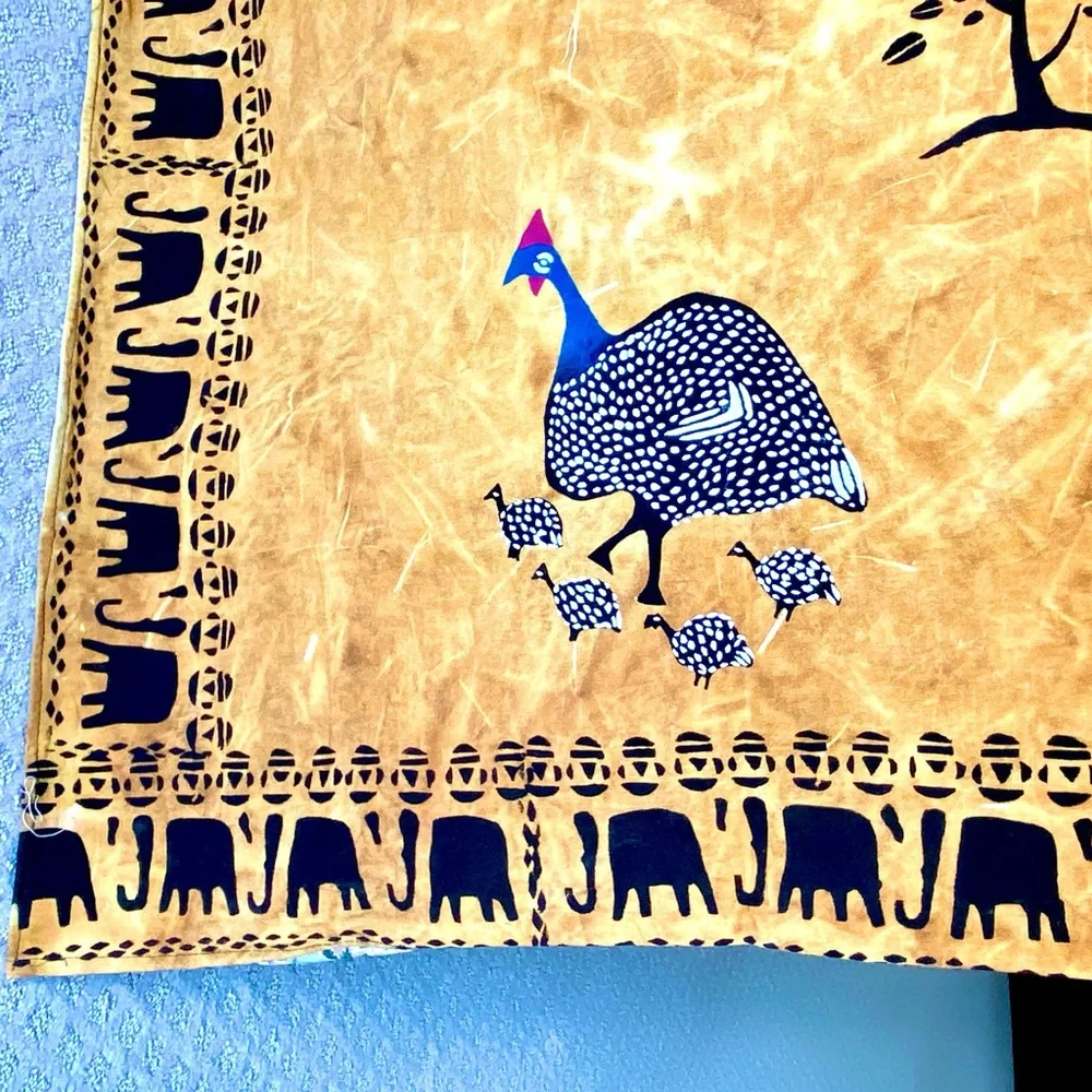 New from South Africa hand decorated table cloth with bird and elephant design.
